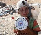 Ad Deirat, West Bank, Dump, <br />
Muhammad Ibrahim, above, tested a watch. <br />
Rina Castelnuovo for The New York Times